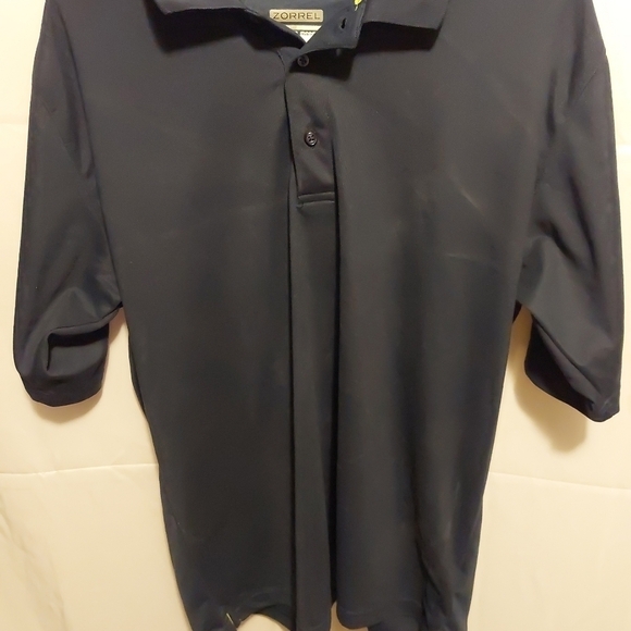 Men's ZORREL Technicore Blue Short Sleeve Polo - Picture 1 of 4